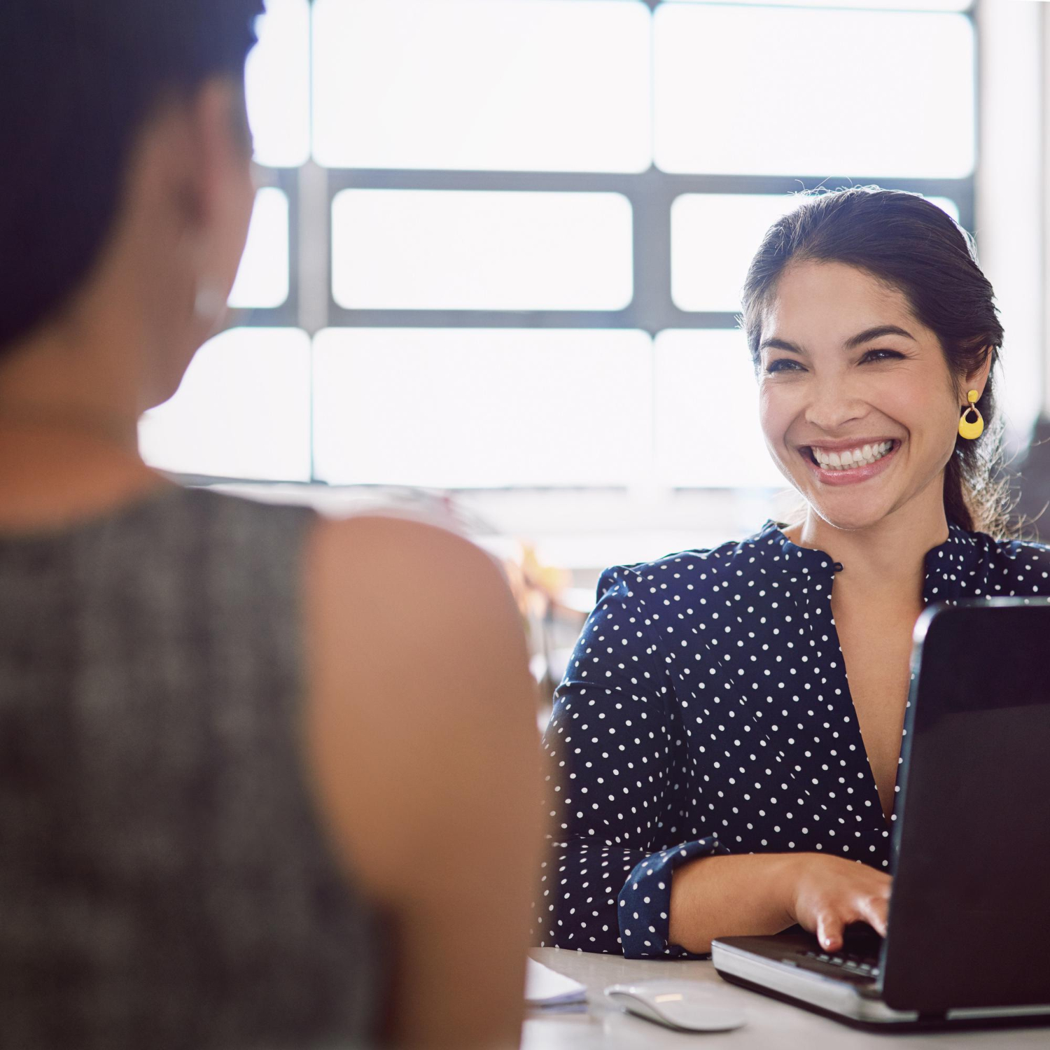 Coworking happy and business women talking for a meeting interviewp